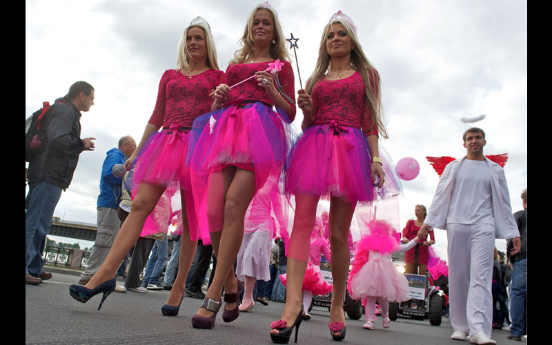 Blonds participate in a parade along the river Daugava Latvia's capital Riga, during the "Go Blonde" event. Decked out in pink, hundreds of blondes marched through the streets of the Latvian capital Riga Saturday in a rally started to lift the Baltic state's spirits in a deep slump. (AFP)
