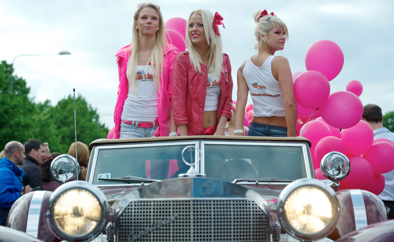 Blonds participate in a parade along the river Daugava Latvia's capital Riga, during the "Go Blonde" event. Decked out in pink, hundreds of blondes marched through the streets of the Latvian capital Riga Saturday in a rally started to lift the Baltic state's spirits in a deep slump. (AFP)
