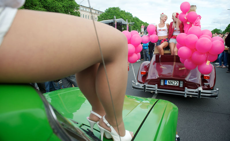 Blonds participate in a parade along the river Daugava Latvia's capital Riga, during the "Go Blonde" event. Decked out in pink, hundreds of blondes marched through the streets of the Latvian capital Riga Saturday in a rally started to lift the Baltic state's spirits in a deep slump. (AFP)
