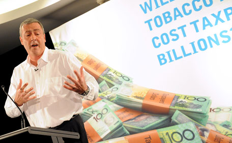 British American Tobacco Australia chief executive David Crow  launches a national media campaign against plain packaging for cigarettes in Sydney on May 17, 2011. Despite the fact that over 15,000 Australians die of smoking-related diseases every year, the tobacco industry threatened to slash the price of cigarettes if Australia goes ahead with plans to introduce plain packaging plastered with graphic health warnings. (AFP)