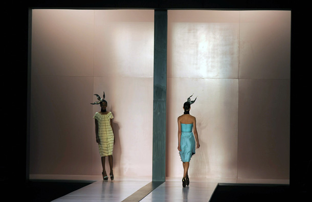 Models present creations by Acquastudio, during the Rio Fashion Week, Summer 2012 collection, at the Pier Maua, in Rio de Janeiro, Brazil. (AFP)