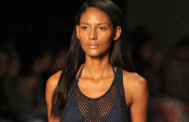 A model presents a creation by designer Totem during the Rio Fashion Week, Summer 2012 collection, at the Pier Maua, in Rio de Janeiro, Brazil. (AFP)