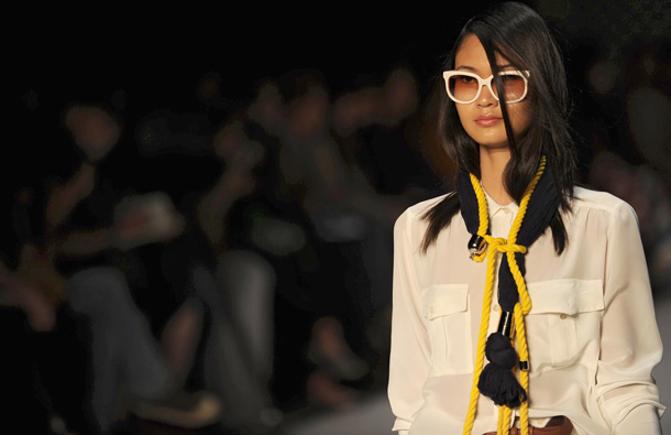 A model presents a creation by designer Totem during the Rio Fashion Week, Summer 2012 collection, at the Pier Maua, in Rio de Janeiro, Brazil. (AFP)