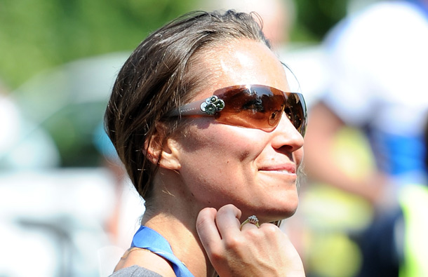 Pippa Middleton looks on after crossing the finish line during the GE Blenheim Triathlon at Blenheim Palace in Woodstock, England. (GETTY/GALLO)