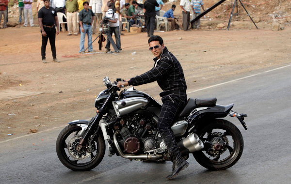 Bollywood actor Akshay Kumar poses for the media before performing a stunt for a promotional event in Mumbai, India. (AP)