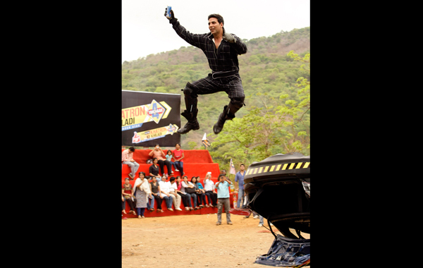 Bollywood actor Akshay Kumar jumps after performing a stunt for a promotional event in Mumbai, India. (AP)