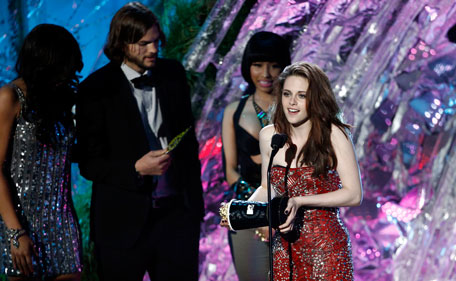 Kristen Stewart accepts the award for best female performance at the MTV Movie Awards on Sunday, June 5, 2011, in Los Angeles. (AP)