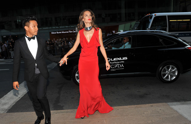 Designer Prabal Gurung, left, and model Alessandra Ambrosio arrive in a Lexus at the 2011 CFDA Fashion Awards in New York. (AP)