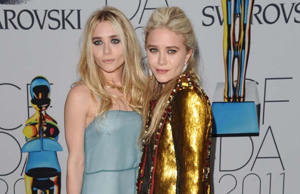 Ashley Olsen, left, and Mary-Kate Olsen, right, attend the 2011 CFDA Fashion Awards at Alice Tully Hall in New York. (AP)