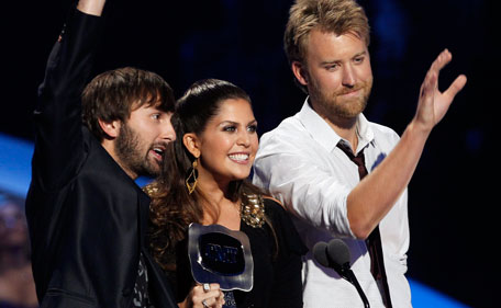 From left to right, Charles Kelly, Hillary Scott, and Dave Haywood of Lady Antebellum accept the Group Video of the Year Award at the 2011 CMT Music Awards in Nashville, Tenn. on Wednesday, June 8, 2011.  (AP)