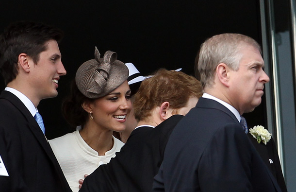 Kate, Duchess of Cambridge (2L) stands amongst members of Britain's royal family Prince Harry (2R) and Prince Andrew (R) on the balcony ahead of The Derby horse race during the second day of the Epsom Derby Festival, in Surrey, southern England, on June 4, 2011. (AFP)