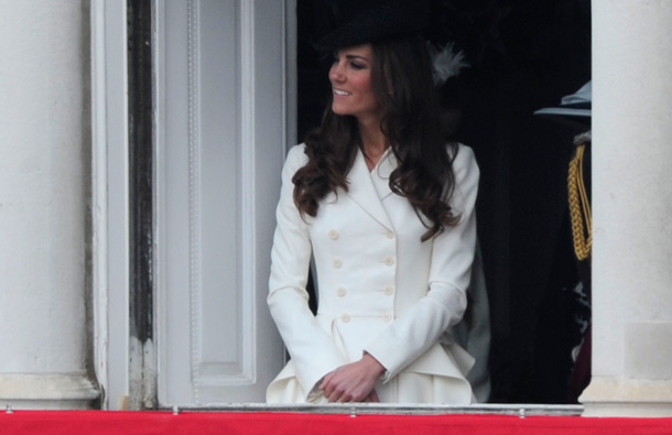 The Duchess of Cambridge looks on from the Duke of Wellington's former office as she attends the Queen's Birthday Parade, "Trooping the Colour", at the Horse Guards Parade, in London, on June 11, 2011. (AFP)