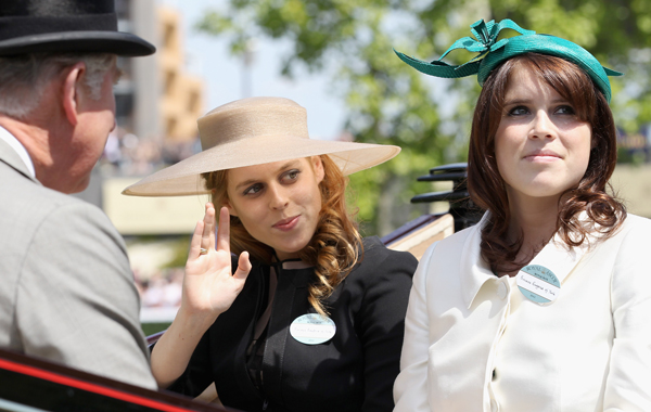Princess Beatrice and Princess Eugenie (R) arrives in a horse drawn carriage for the opening day of Royal Ascot at Ascot Racecourse in Ascot, United Kingdom. (GETTY)