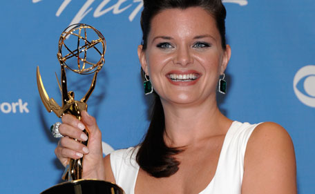 Actress Heather Tom poses with her award in the press room at the 38th Annual Daytime Emmy Awards in Las Vegas on Sunday, June 19, 2011. Tom won the award for Outstanding Supporting Actress in a Drama Series. (AP)