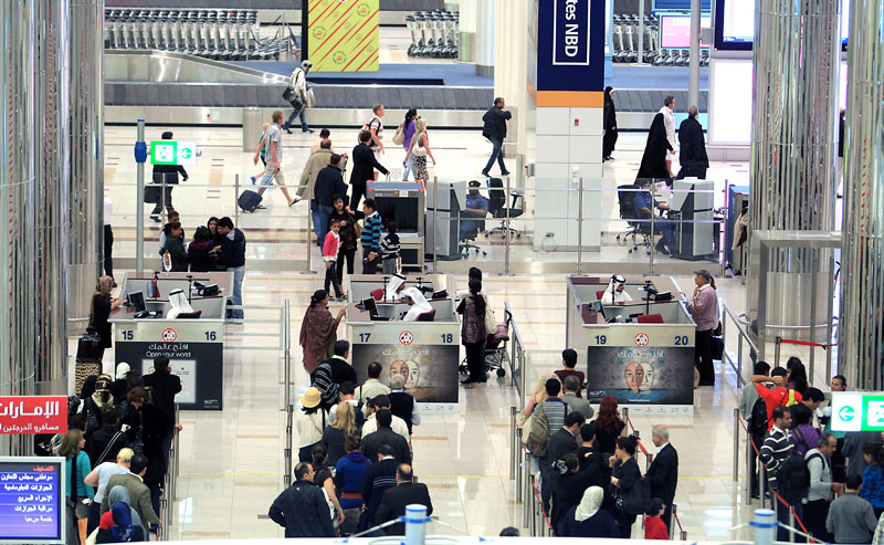 Passengers are lined up in queue at the Immigration section of Dubai International Airport. (FILE)