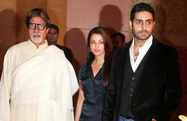 Amitabh Bachchan arrives with his daughter-in-law Aishwarya Rai Bachchan and his son Abishek Bachchan. (AFP)
