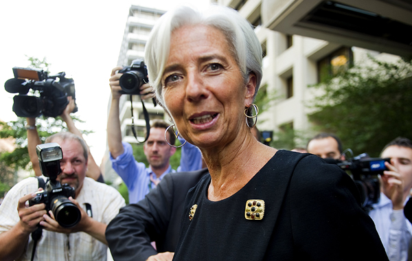 French Finance Minister Christine Lagarde departs the International Monetary Fund (IMF) headquarters in Washington, DC. (AFP)