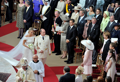 (L-R) Princess Charlene of Monaco and Prince Albert Of Monaco leave the church after the religious ceremony of the Royal Wedding of Prince Albert II of Monaco to Charlene Wittstock in the main courtyard at Prince's Palace on July 2, 2011 in Monaco, Monaco. The Roman-Catholic ceremony follows the civil wedding which was held in the Throne Room of the Prince's Palace of Monaco on July 1. With her marriage to the head of state of the Principality of Monaco, Charlene Wittstock will become Princess consort of Monaco and gain the title, Princess Charlene of Monaco. Celebrations including concerts and firework displays are being held across several days, attended by a guest list of global celebrities and heads of state.  (GETTY IMAGES)
