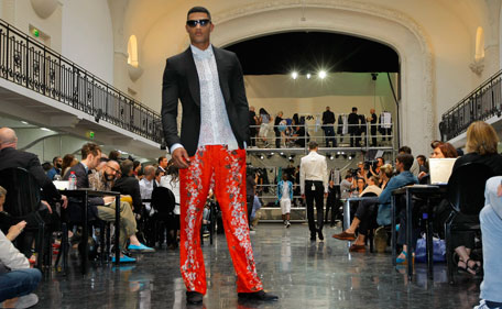A model wears a creation by French designer Jean Paul Gaultier as part of spring-summer 2012 men's fashion, presented in Paris, Thursday, June 23, 2011. (AP)