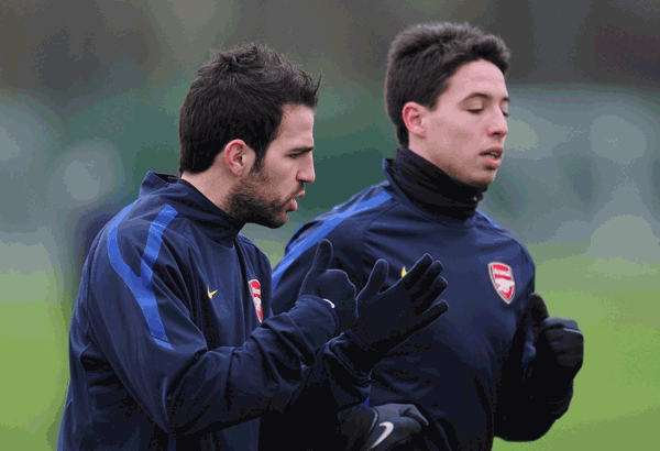 Cesc Fabregas (left) and Samir Nasri seem set to stay at Arsenal. (FILE)