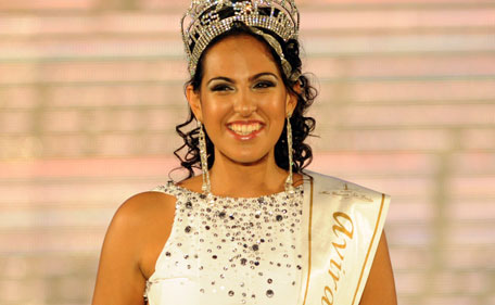 Sri Lankan beauty queen Stephanie Siriwardena smiles as she is crowned Miss Sri Lanka during a glittering contest in Colombo on July 11, 2011. The winner will represent Sri Lanka at the Miss Universe pageant 2011. (AFP)