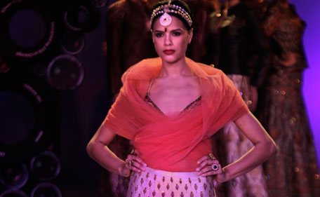 A model displays creation of Indian designer J.J. Valaya, during Delhi Couture Week 2011, in New Delhi, India, Friday, July 22, 2011.  (AP)