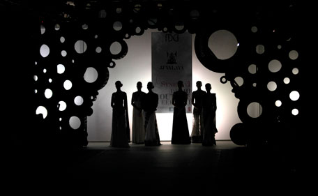 Models display creations of Indian designer J.J. Valaya, during Delhi Couture Week 2011, in  New Delhi, India, Friday, July 22, 2011.  (AP)