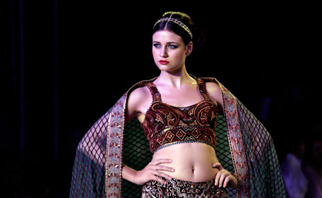 A model displays creation of Indian designer J.J. Valaya, during Delhi Couture Week 2011, in  New Delhi, India, Friday, July 22, 2011.  (AP)