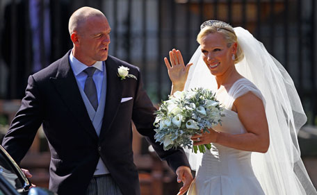 Mike Tindall and Zara Phillips depart after their Royal wedding at Canongate Kirk on July 30, 2011 in Edinburgh, Scotland. The Queen's granddaughter Zara Phillips will marry England rugby player Mike Tindall today at Canongate Kirk. Many royals are expected to attend including the Duke and Duchess of Cambridge. (GETTY)
