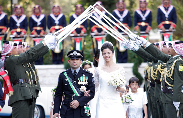 Jordan's Prince Rashid bin El Hassan walks with his bride Princess Zeina during their wedding ceremony at Bassman Palace in Amman. (REUTERS)