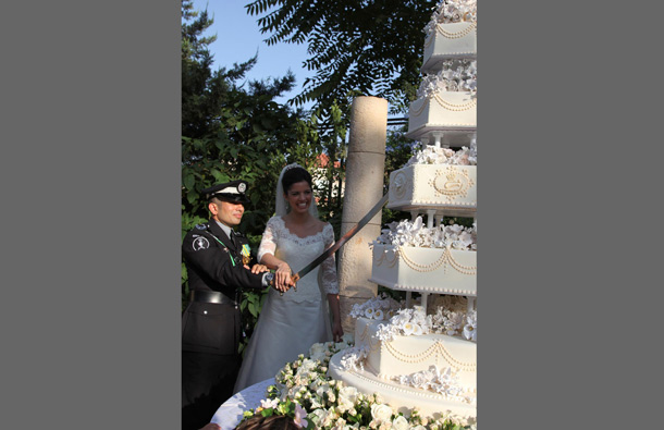 Jordan's Prince Rashid bin El Hassan and his bride Princess Zeina cut their wedding cake during a ceremony at the Bassman Palace in Amman. (REUTERS)