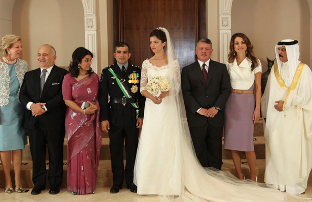 Jordan's Prince Rashid bin El Hassan (5th L) and his bride Princess Zeina (C) pose with other royalty during their wedding ceremony at the Bassman Palace. From (L-R) Jordan's Queen Noor, Belgium's Queen Paola, Jordan's Prince Hassan and his wife Princess Sarvath El Hassan, Prince Rashid, Princess Zeina, King Abdullah and his wife Queen Rania. (REUTERS)