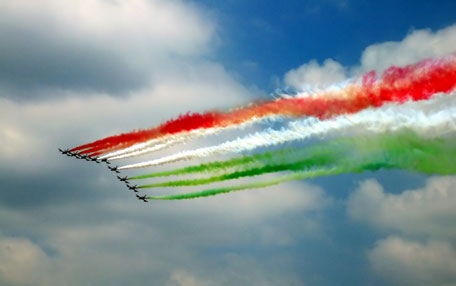 Indian Air Force jet fighters strewn the air with the tri-colour of the Indian national flag