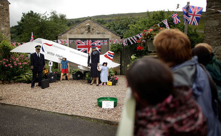 Characters are displayed as part of the annual scarecrow festival on August 13, 2011 in Kettlewell, England. During the two week festival the rural Yorkshire Dales village comes to life with both traditional scarecrows and more modern takes, including parodies of current affairs and celebrites.  (GETTY)