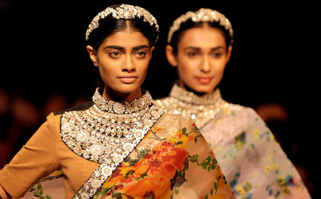 Indian models display creations by designer Sabyasachi during the Lakme Fashion Week in Mumbai, India, Friday, Aug. 19, 2011. (AP)