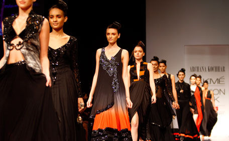 Indian models display creations by designer Archana Kochhar during the Lakme Fashion Week in Mumbai, India, Wednesday, Aug. 17, 2011. (AP)