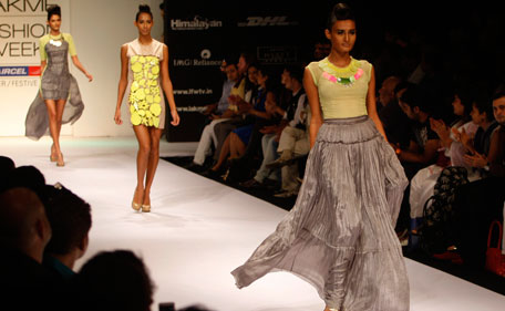 Indian models display creations by designer Drashta during the Lakme Fashion Week in Mumbai, India, Saturday, Aug. 20,2011. (AP)