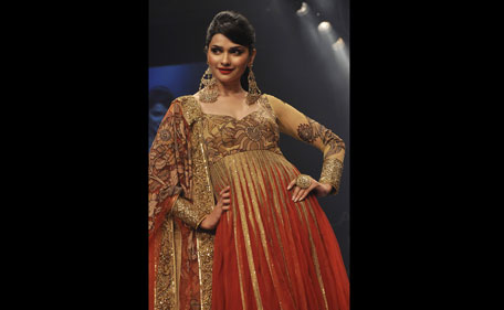 Indian Bollywood actress Prachi Desai walks the ramp for designer Neeta Lulla on the fourth day of Lakme Fashion Week (LFW) Winter/Festival 2011 in Mumbai on August 20, 2011. (AFP)