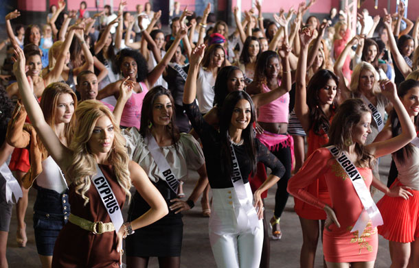 Miss Universe pageant contestants dance during their visit to a samba school in Sao Paulo, Brazil, Friday Aug. 26, 2011. The 60th anniversary of the Miss Universe pageant is scheduled for Sept. 12 from Sao Paolo. Last year's winner was Mexico's Jimena Navarrete. (AP)