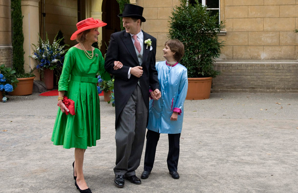 Ferdinand Prince of Prussia, center, arrives with his mother, Duchess Donata von Oldenburg, left, and with his sister Comelie-Cecile Princess of Prussia prior to his wedding with Princess Sophie of Isenburg in the church in Potsdam, Saturday Aug. 27, 2011. (AP)