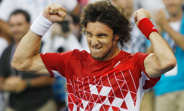 Juan Monaco of Argentina reacts after beating Tommy Haas of Germany during the US Open tennis tournament in New York, Saturday, Sept 3, 2011. (AP)