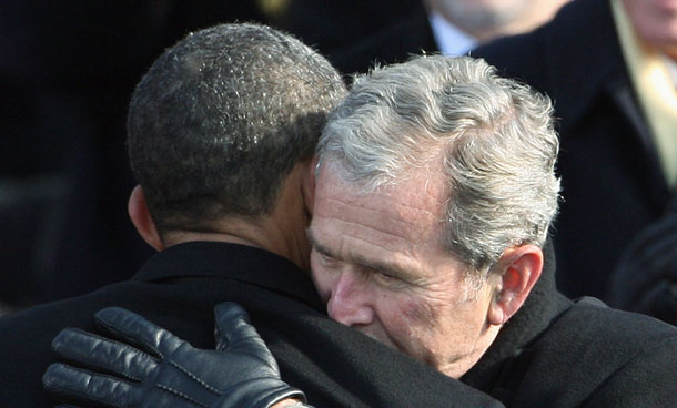 In this Jan 20, 2009, file photo former President George W. Bush, right, hugs President Barack Obama after Obama was sworn in at the US Capitol in Washington. Handing off the wars and the swollen anti-terrorism apparatus to his successor, Bush said in his final White House address in 2009 that "most Americans were able to return to life much as it had been before 9/11." He quickly added: "I never did." (AP)