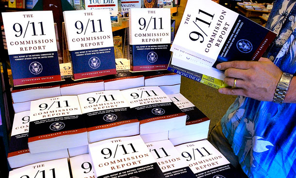 A patron of the Barnes & Noble bookstore in Springfield, Ill, reads a copy of the "The 9/11 Commission Report. (AP)