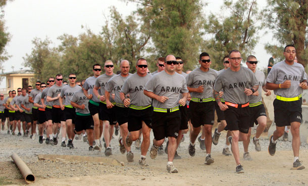 US soldiers from Task Force Bronco take part in a memorial run to commemorate the 10th anniversary of the 9/11 attacks, at FOB Shinwar, a US military camp in Nangarhar, Afghanistan September 11, 2011. (REUTERS)