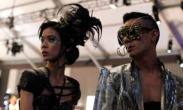 Loan Tran (L) and Rabhy Ortega attends at the Spring/Summer 2012  New York Fashion Week September 10, 2011. (REUTERS)