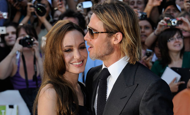 Actor Brad Pitt and actress Angelina Jolie attends a gala screening for the film '"Moneyball" during the Toronto International Film Festival on Friday, Sept 9,  2011 in Toronto. (AP)