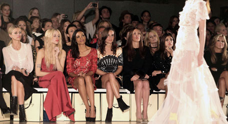 Members of the audience at a fashion show, part of The London Fashion Week, include Pippa Middleton, the sister of Britain's Kate, Duchess of Cambridge, front 4th left, with from left, Donna Air, Peaches Geldof, and American actress Rosario Dawson,  pictured during the Temperley London Spring/Summer 2012 fashion show held at the British Museum in London, Monday Sept. 19, 2011. (AP)
