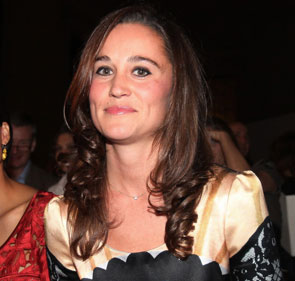 Members of the audience at a fashion show during The London Fashion Week, include Pippa Middleton, the sister of Britain's Kate, Duchess of Cambridge, right, with American actress Rosario Dawson, and Peaches Geldof, left, pictured during the Temperley London Spring/Summer 2012 fashion show held at the British Museum in London, Monday Sept. 19, 2011. (AP)