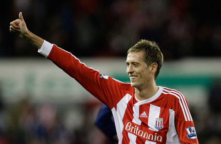 Stoke City's Peter Crouch gives a thumbs-up to supporters after his team's 1-1 draw against Manchester United in their English Premier League match at the Britannia Stadium in Stoke, England, on Saturday. (AP)