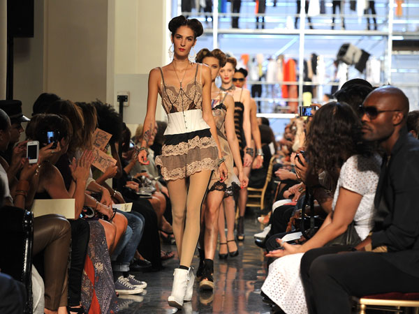 PARIS, FRANCE - OCTOBER 01:  Models walk the runway during the Jean Paul Gaultier Ready to Wear Spring / Summer 2012 show during Paris Fashion Week  on October 1, 2011 in Paris, France.  (GETTY)